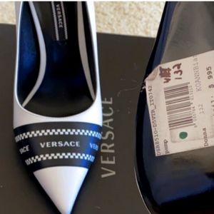 Versace shoes are new never worn.